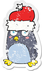 retro distressed sticker of a cartoon penguin