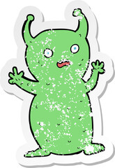 retro distressed sticker of a cartoon funny little alien