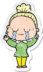 distressed sticker of a cartoon crying old lady
