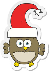 sticker of a cartoon little christmas owl