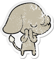 distressed sticker of a cartoon smiling elephant