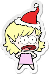 sticker cartoon of a shocked elf girl wearing santa hat