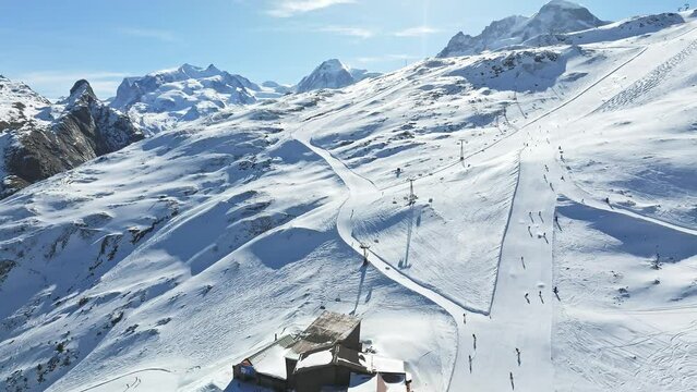 Aerial panorama view of the luxury hotel and the astronomic observatory at the Gornergrat, in the background of the Matterhorn or Cervino mount, Zermatt, Valais, Switzerland, Europe