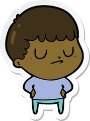 sticker of a cartoon grumpy boy