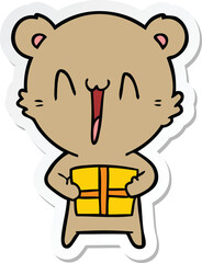 sticker of a happy bear with gift cartoon