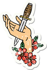 traditional distressed sticker tattoo of a dagger in the hand
