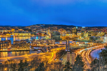 Oslo Norway, night city skyline at business district and Barcode Project