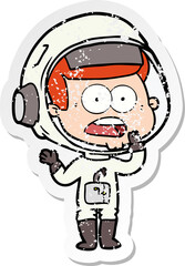 Obraz premium distressed sticker of a cartoon surprised astronaut