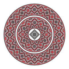 Round plate with a pixelated geometric pattern in warm colors