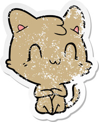 distressed sticker of a cartoon happy cat