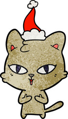 textured cartoon of a cat wearing santa hat