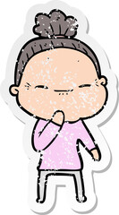 distressed sticker of a cartoon peaceful old woman