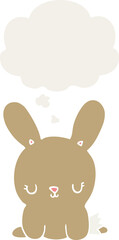 cute cartoon rabbit and thought bubble in retro style