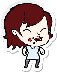 sticker of a cartoon vampire girl with blood on cheek