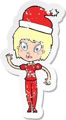retro distressed sticker of a cartoon woman ready for christmas