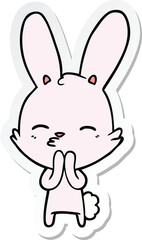 sticker of a curious bunny cartoon