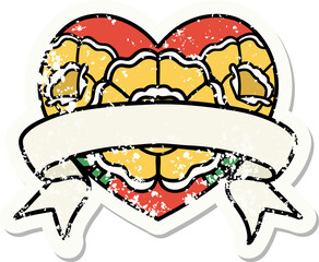 traditional distressed sticker tattoo of a heart and banner with flowers