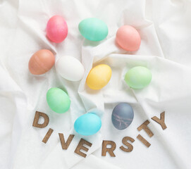 Group of Various Colored, Imperfect Eggs with Diversity Word