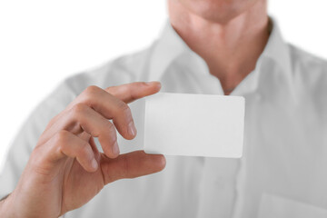 Businessman holds white blank card