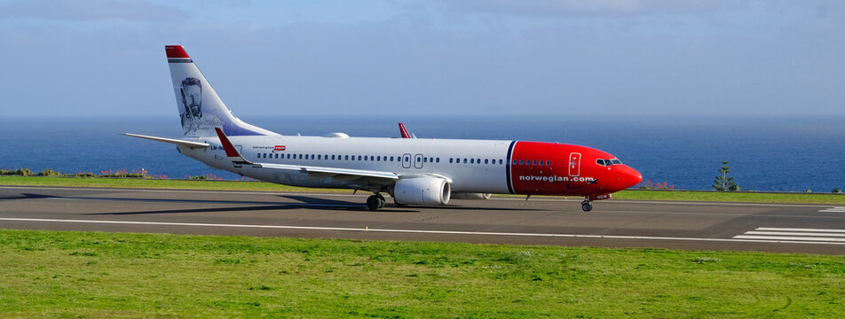 Boeing 737 800 Norwegian Air Shuttle taxying at Madeira Airport, Madeira Island, Portugal