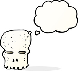 cartoon spooky skull with thought bubble