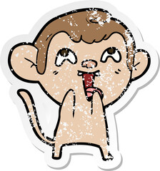 distressed sticker of a crazy cartoon monkey