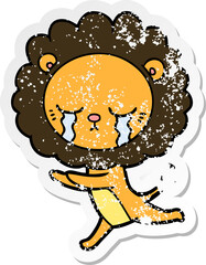 distressed sticker of a crying cartoon lion