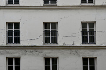 building facade with exterior cracks