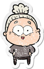distressed sticker of a cartoon happy old woman