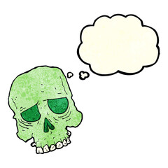 cartoon spooky skull with thought bubble