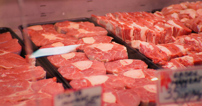 Raw beef meat osso buco shank steak lower part of cows foreleg. Red meat selection in butchers shop, fresh beef osso.