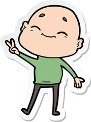 sticker of a happy cartoon bald man