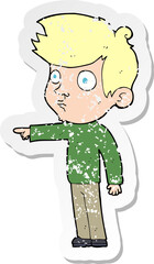 retro distressed sticker of a cartoon pointing boy