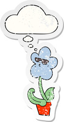 cool cartoon flower and thought bubble as a distressed worn sticker