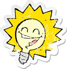 retro distressed sticker of a happy light bulb cartoon