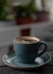 Close-up of hot coffee  cup. Hot ceramic blue coffee cup . Hot Coffee Drink Concept