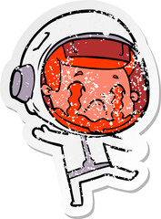 distressed sticker of a cartoon crying astronaut