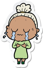 sticker of a cartoon crying old lady