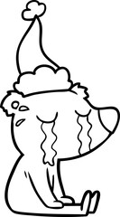 line drawing of a crying sitting polar bear wearing santa hat