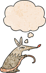 cartoon rat and thought bubble in grunge texture pattern style