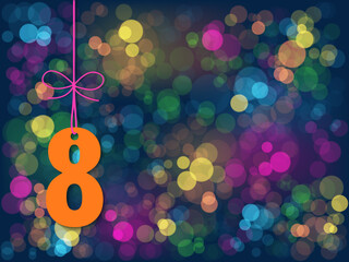No 8 suspended by string on background of colorful bokeh lights