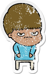 distressed sticker of a annoyed cartoon boy
