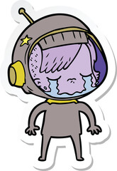 sticker of a cartoon crying astronaut girl