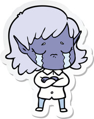 sticker of a cartoon crying elf girl