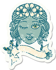 grunge sticker with banner of a maidens face winking
