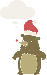 cartoon bear wearing christmas hat and thought bubble in retro style