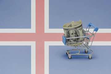 Metal shopping basket with dollar money banknote on the national flag of iceland background. consumer basket concept. 3d illustration