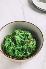 Seaweed Salad is Super Healthy and Nutritious Snack with sesame seeds, dietary supplement, superfood of the sea, Green Chuka or Algae