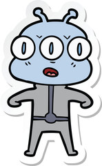 sticker of a cartoon three eyed alien
