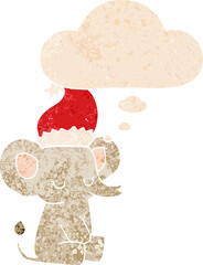 cute christmas elephant and thought bubble in retro textured style